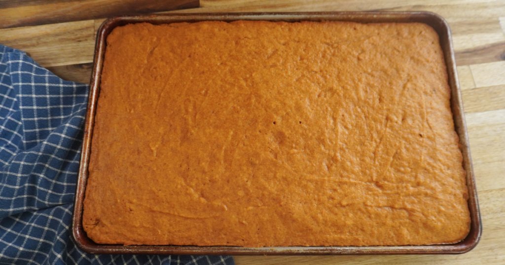 Baked pumpkin bars in jelly roll pan