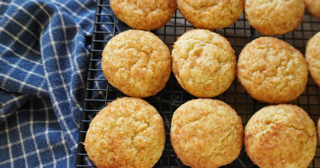 cookies on cooling rack with blue checkered towel