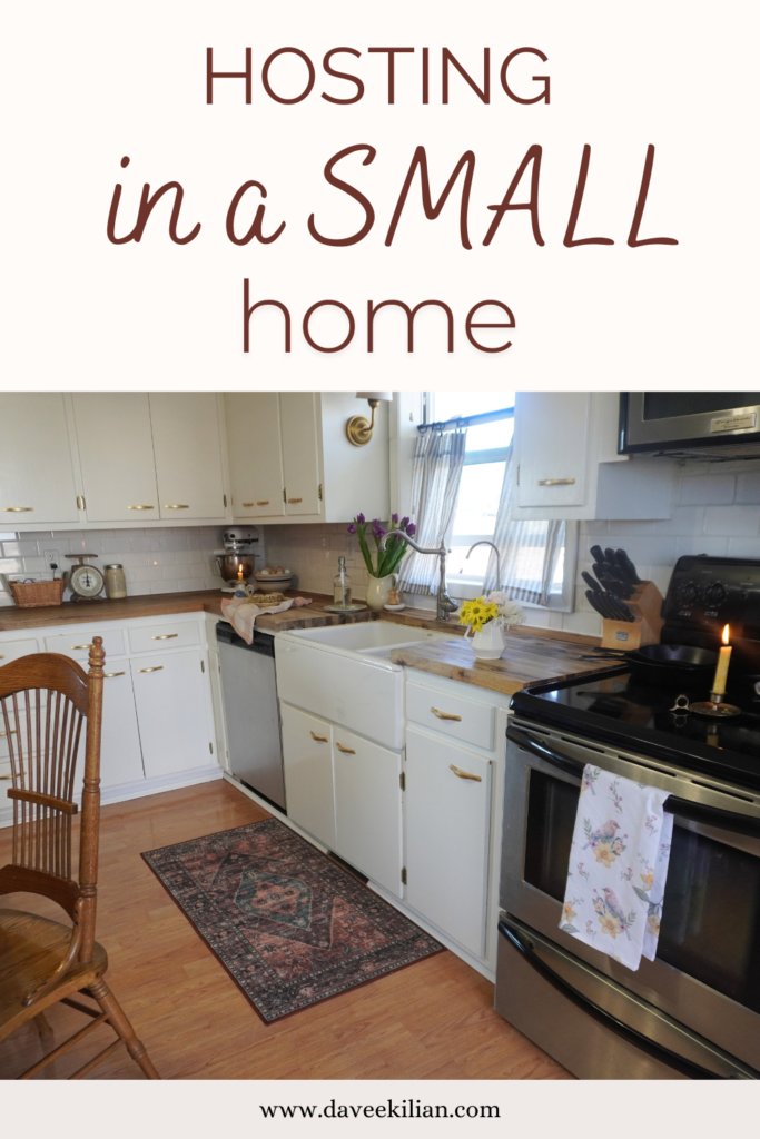 hosting in a small home pin with picture of kitchen cabinets, sink and counter and stove