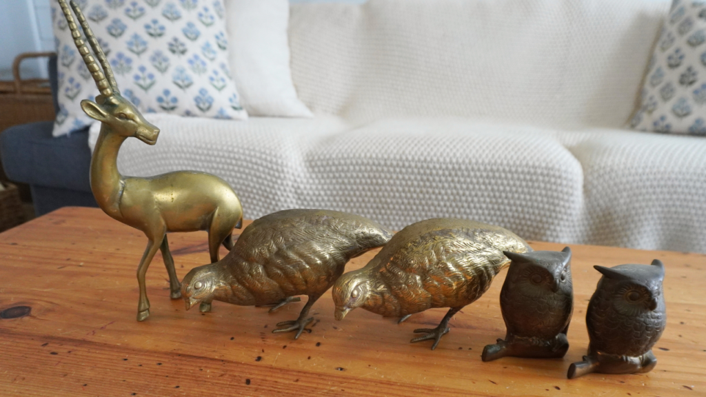 Brass figurines, gazlelle, birds and owls