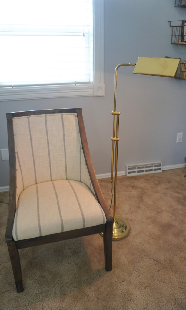chair and brass lamp