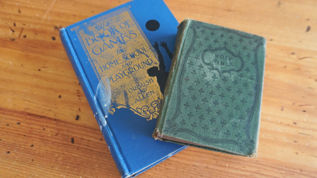 Two vintage books stacked